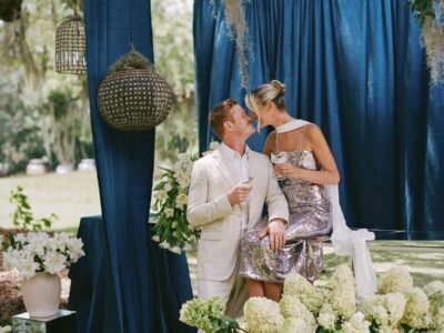 Newly married couple celebrating at Pine Creek Place outdoor wedding venue near Charleston