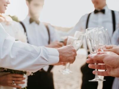 Champagne toast during an outdoor wedding reception at Pine Creek Place near Charleston
