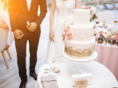 Wedding cake displayed during reception at Pine Creek Place outdoor venue